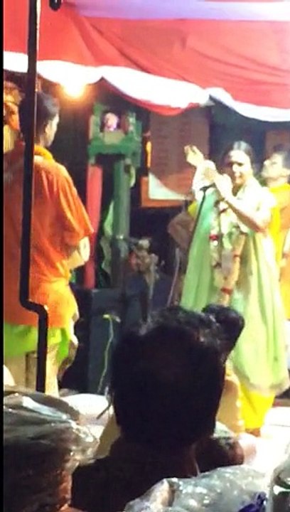 "Hari Sankirtan" a traditional dance with song by village lady.