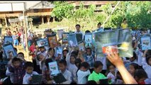 DISTRIBUTION FOURNITURES SCOLAIRES  ECOLES MUONG E2