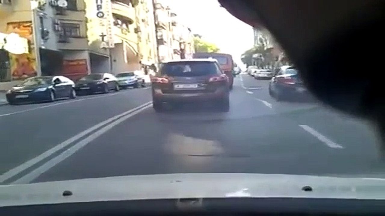 Motorcyclist Crashes Into Open Door