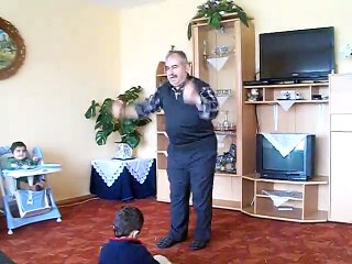 A MAN 80 YEARS OLD ( DANCING)
