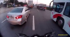 Lucky scooter driver almost killed by a truck after he violently felt on the ground.