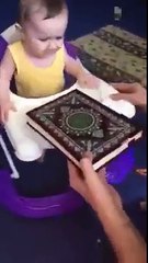 Little baby Happy With Quran Video