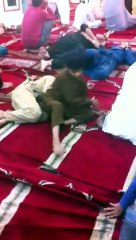 in mahfil  e melad sleeping people