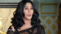Cher cancels tour; blames viral infection