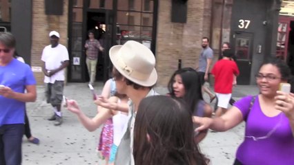 Harry Styles & James Corden give homeless man money in NYC