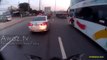Scooter rider gets unbelievably lucky narrowly escaping being run over by truck