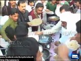 PAT Workers Jump Over Food After Tahir Ul Qadri’s Speech In Bakhar