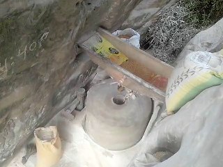 Old traditional Water and Stone mill for making flour from Grains