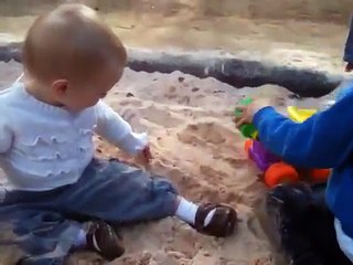 Little girl in the sand