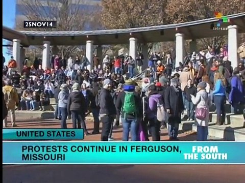 Protests continue in Ferguson and across US against racism