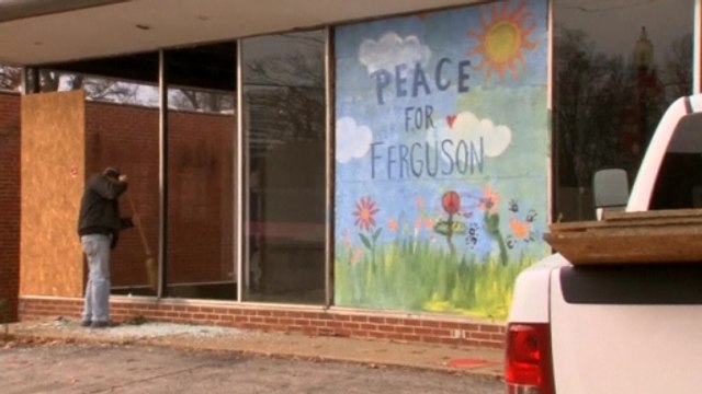 Clean-up begins in Missouri as Ferguson protests spread