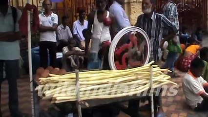 Poor Man crushes sugarcane to extract its juice for living in India by wildindiafilms
