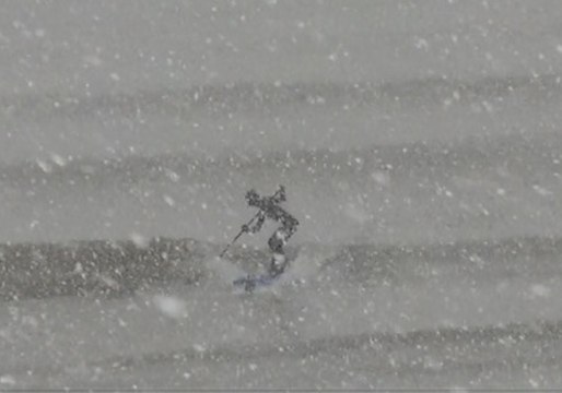 Surfing Through a Snow Blizzard