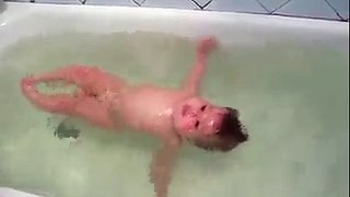 Cute baby in bath tub