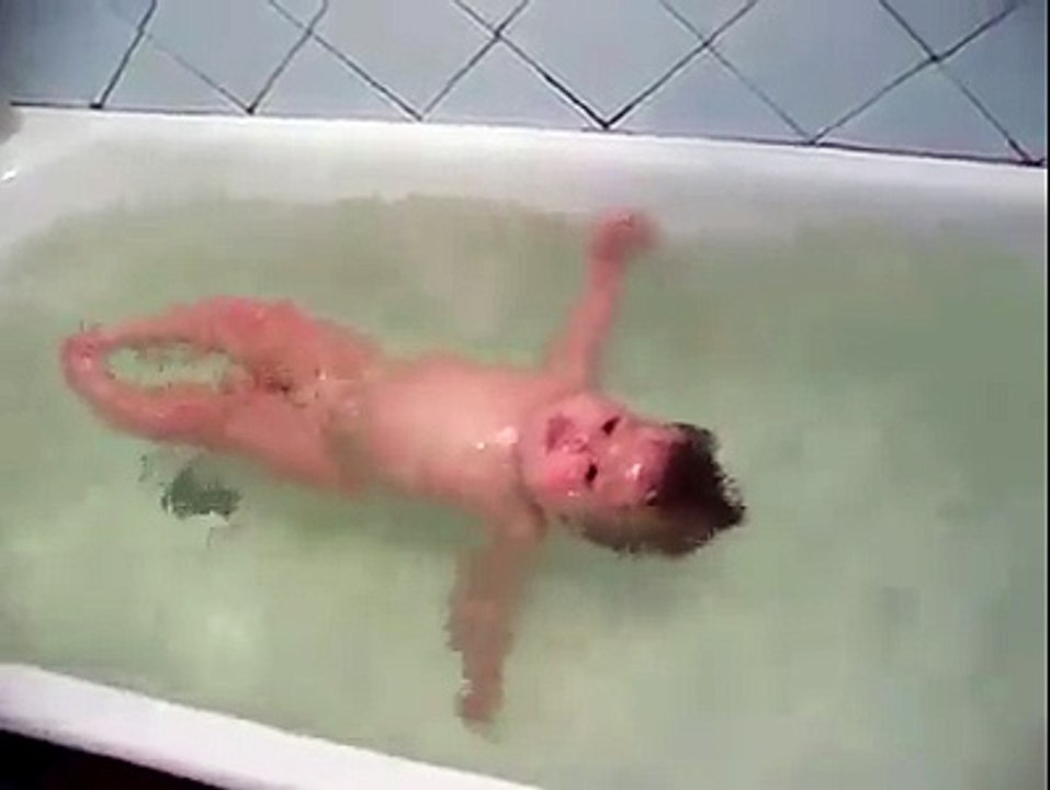 Cute baby in bath tub