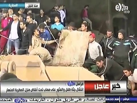 انتشال جثة طفل من أنقاض عقار المطرية المنهار