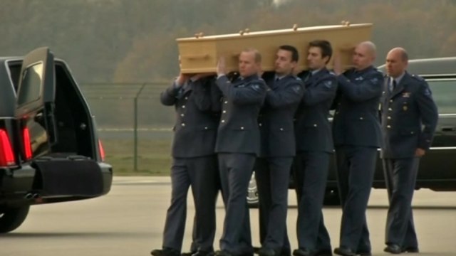 Coffins carrying MH17 victims' remains arrives in the Netherlands