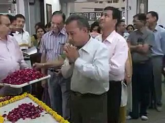 Floral Tribute to the Portrait of Thakarbapa by Ashok Patel