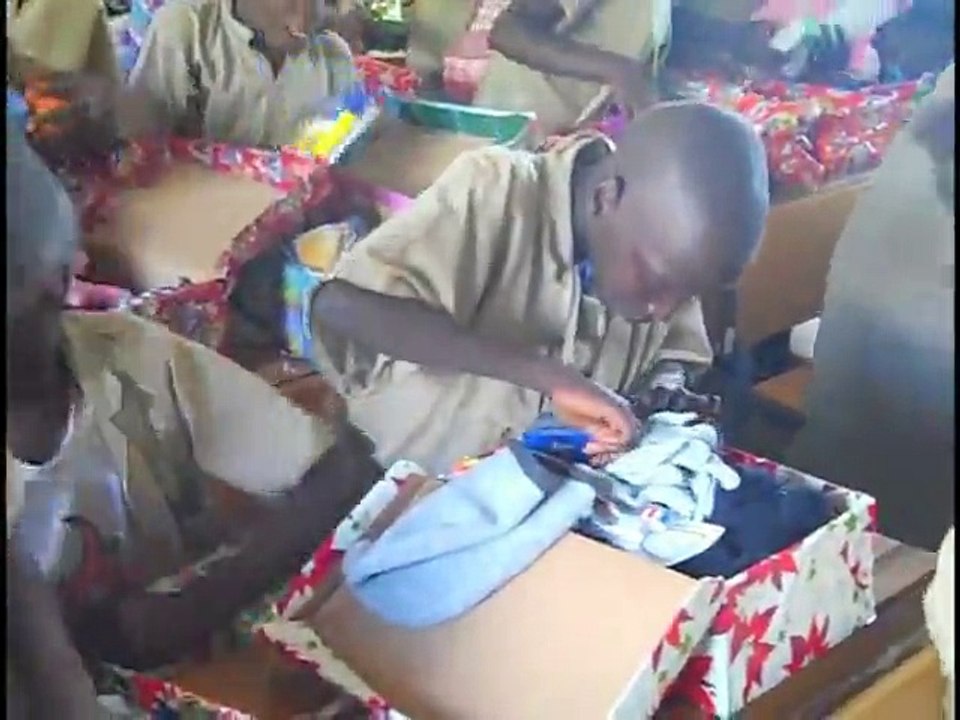 African children opening their Team Hope Christmas shoebox gifts is just awesome and cute!
