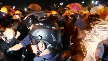 Hong Kong protesters clash with police at government HQ