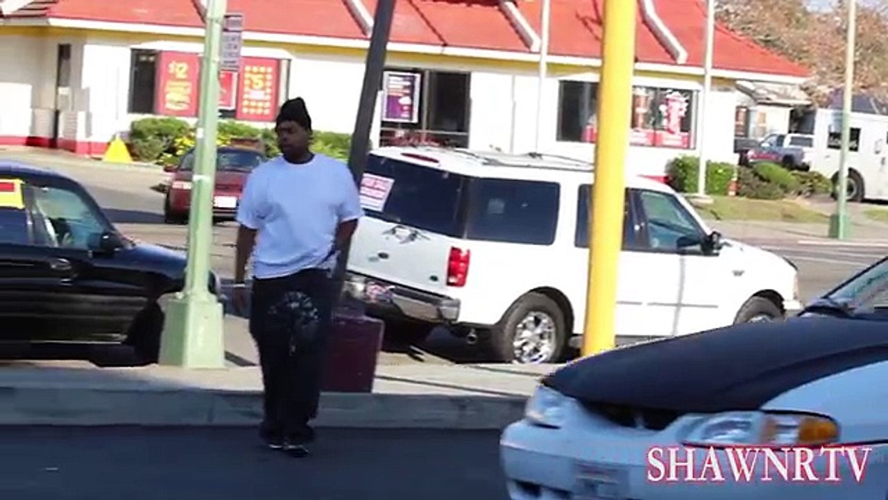 PEEING ON STRANGERS IN THE HOOD PRANK (GONE WRONG)