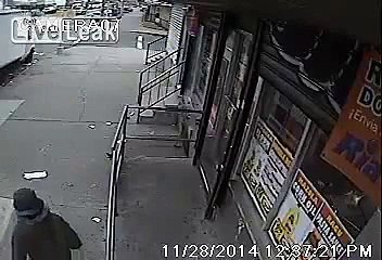 Thief drop-kicks woman carrying infant