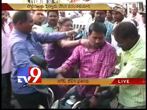 Man thrashed with slippers for harassment - Tv9 Exclusive