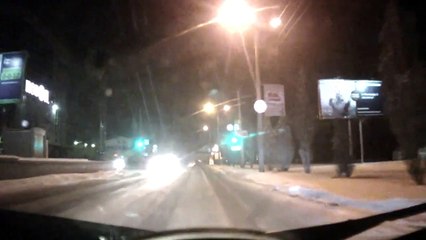 Russia - a drunk woman lying on the route