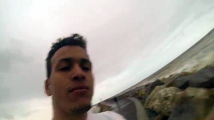 A woman swept away by the sea is filmed by her sauveteur