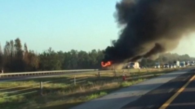 Amateur video captures students fleeing burning bus