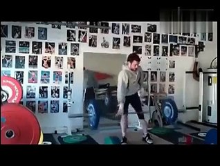 Funny weight lifter doesn't care after weight-lifting