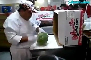 Kughoo Ghoray - Cutting Watermelon .