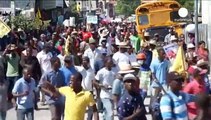 Гаити: демонстранты просят Путина помочь провести выборы