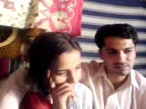 very cute girl giving kisses to boy