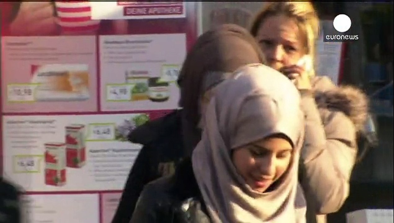 Merkel distances itself from 'Speak German at home' idea