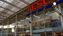 Tesco shares hit 14-year low after fresh profits warning