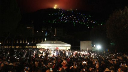 The Pope illuminates giant Christmas tree using a tablet