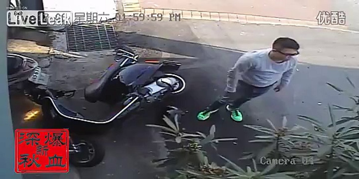 Scooter man almost gets head crushed by truck wheel