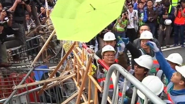 Authorities begin dismantling protest site