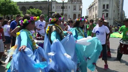 Thousands rally for climate outside Lima talks