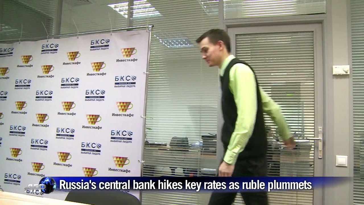 Russia's central bank hikes rate as ruble plummets