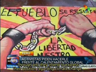 Activists demand COP20 address global warming's real causes