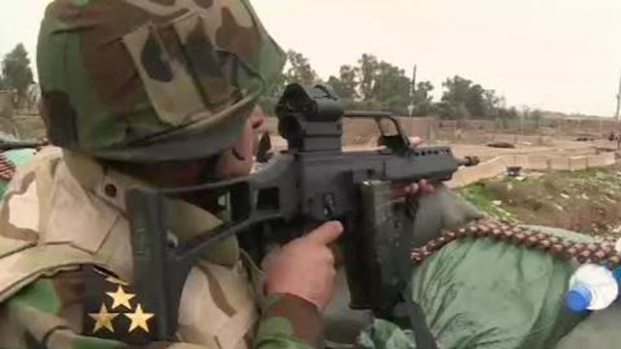 Battle rages for Iraq's Balad city