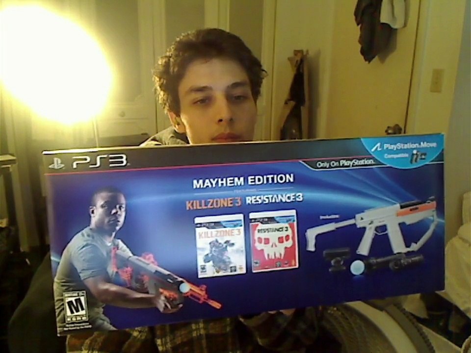 Video Games Being Organized Into A DVD/CD Travel Case In Real Life