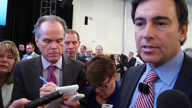 Ford CEO Mark Fields with automotive journalists after media briefing.
