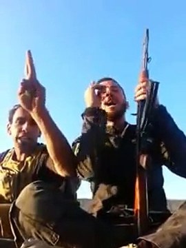 Syrian soldiers singing, surprised by rocket explosion!