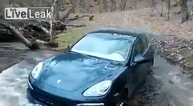 Idiot try out a Porsche Cayenne in the river