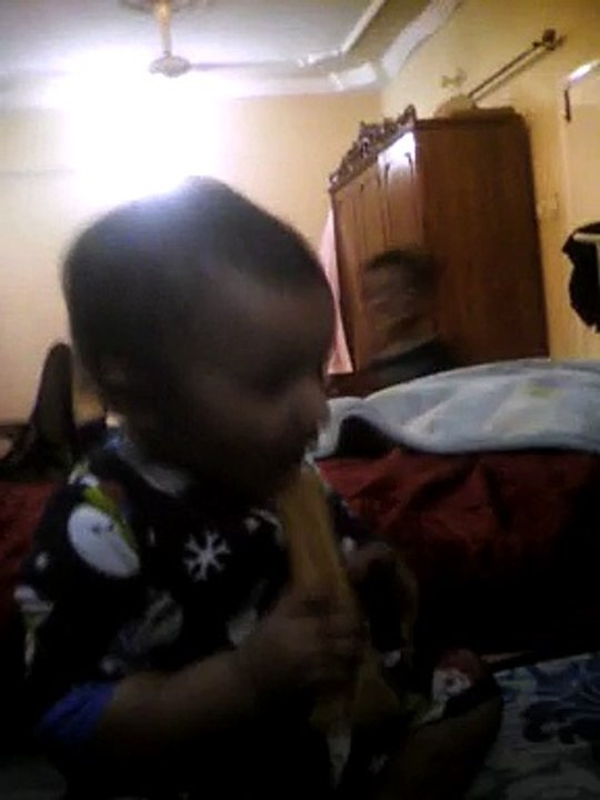 Baby xaviyar eating paya bone