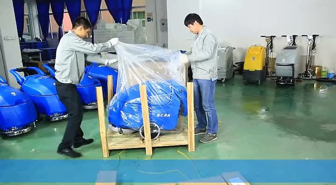 Battery powered walk behind floor scrubber dryer