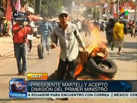 Haitianos celebran dimisión del Primer Ministro Laurent Lamothe